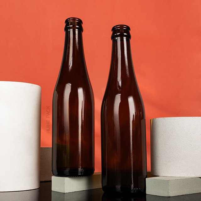 Vente chaude 350 ml Bouteille de bière en verre vide en ambre avec bonnet de couronne