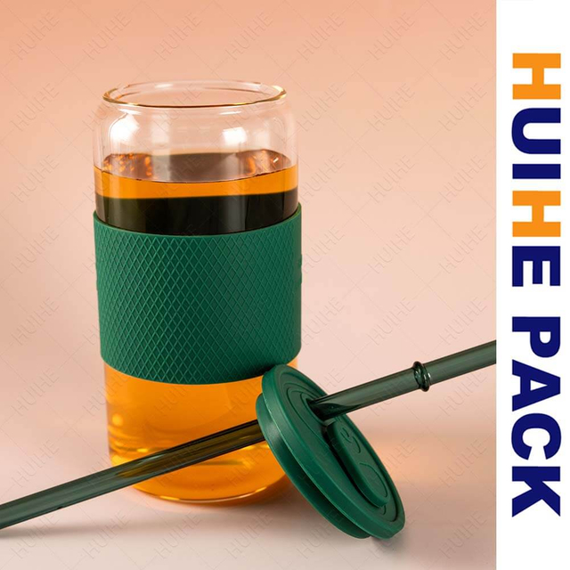 Grande bouteille de boisson cylindrique en verre borosilicat&eacute; transparent avec bande en silicone