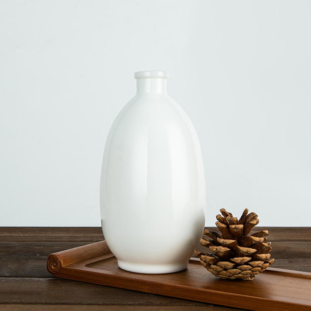 Bouteille de spiritueux ronde en verre opale 50CL