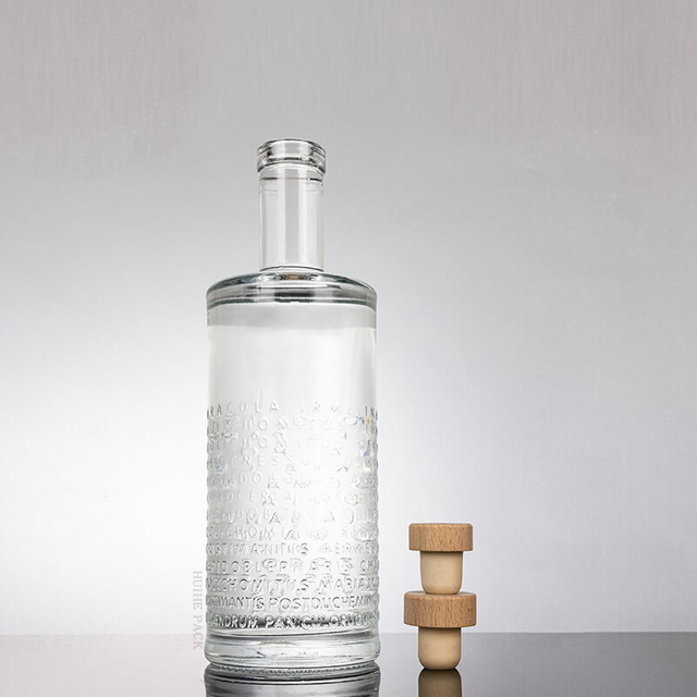 Lettres surélevées bouteille d'alcool en verre cylindre texturé