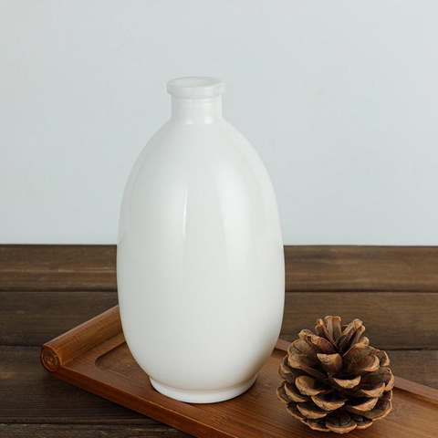 Bouteille de spiritueux ronde en verre opale 50CL