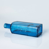 Bouteille d\'alcool carrée en verre bleu de 750 ml
