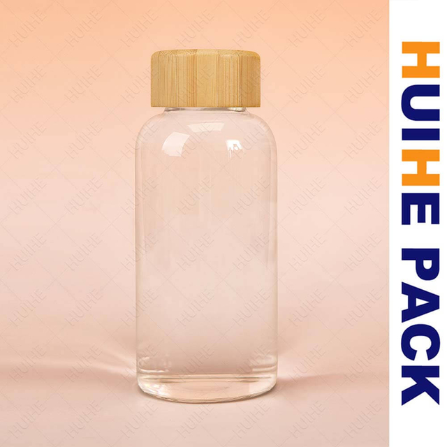 Bouteille d'eau potable en verre borosilicat&eacute; transparent personnalis&eacute; avec capuchon en bambou