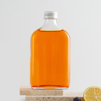 Bouteilles de flasque plat en verre clair