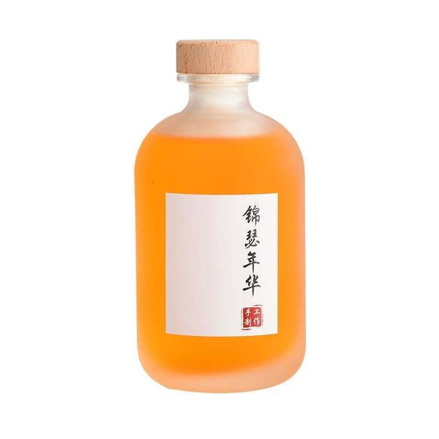 Bouteille en verre de vin à fruits rond clairs