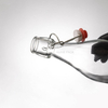 Bouteille de boisson potable en verre transparent de 1000 ml avec dessus pivotant