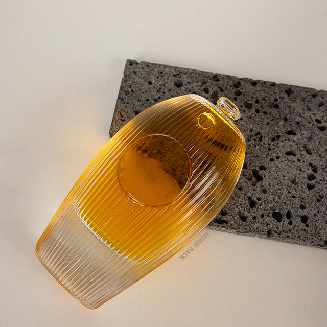 Modèles ovales à perçage verticalement bouteille d'alcool en verre