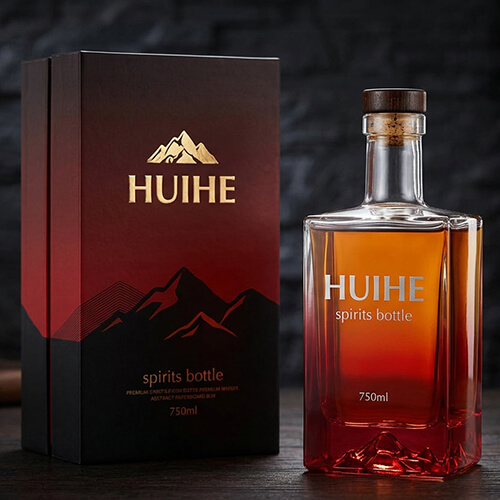 bouteille d"alcool rouge avec bo&icirc;te