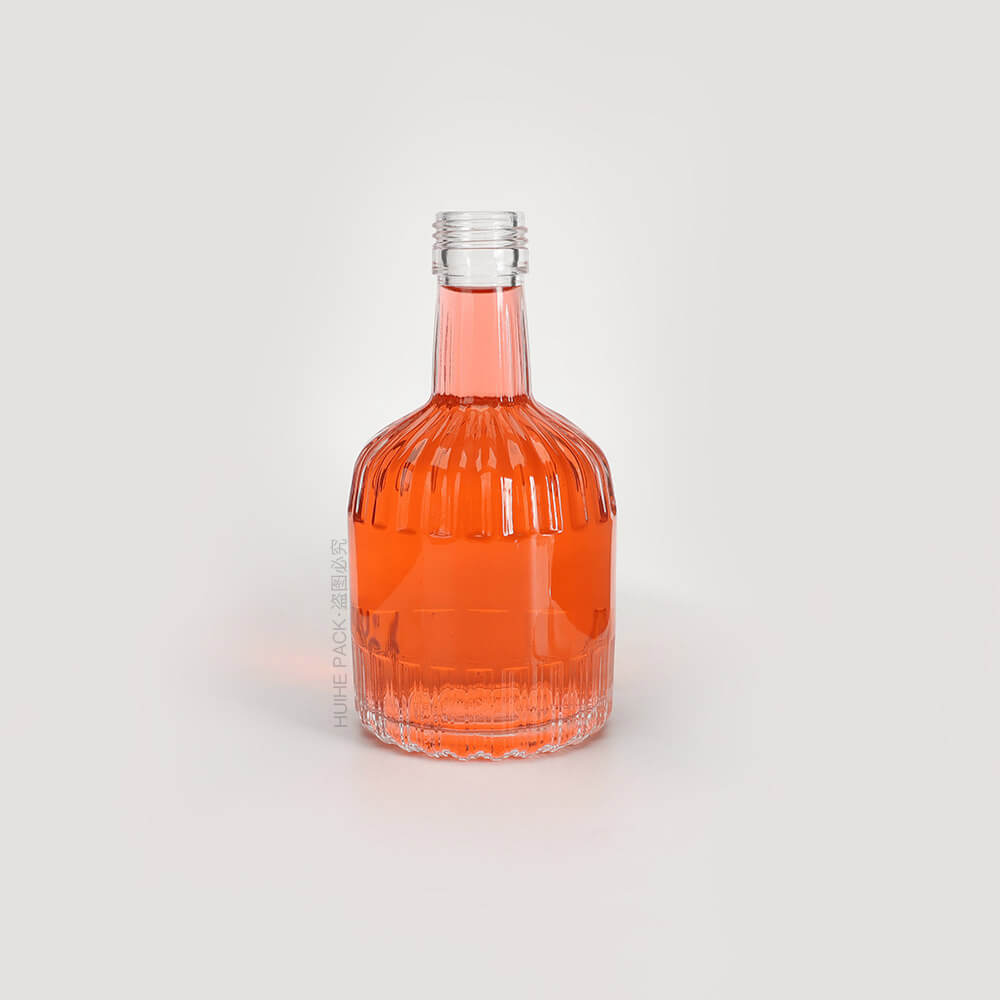 bouteille d'alcool en verre personnalisée