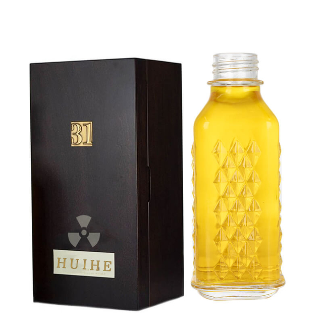 Modèle de 650 ml en relief de bouteille d'alcool en verre semblable à un diamant