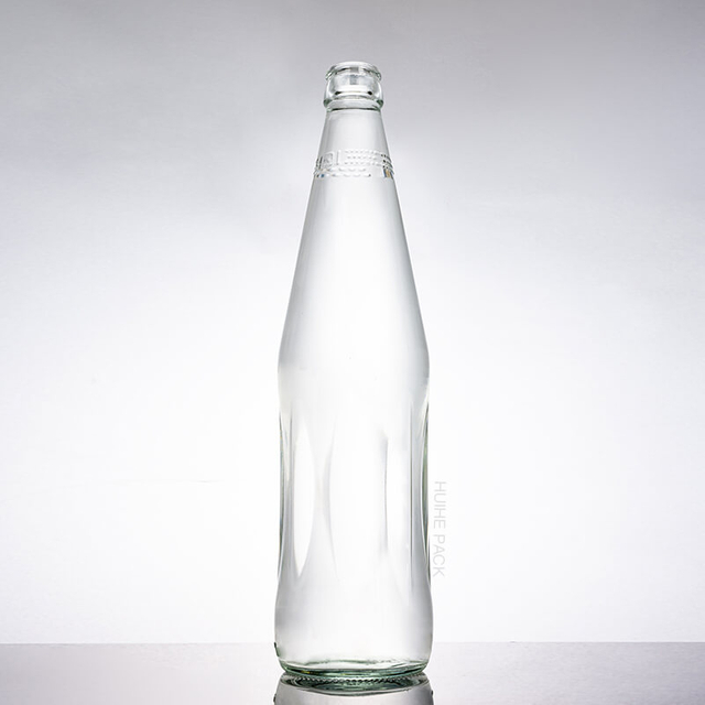 Bouteille de jus de pomme orange en verre transparent de 875 ml avec bouchon couronne