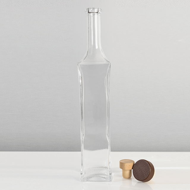 700 ml carré à forme allongée en verre bouteille de spiritueux avec courbes élégantes