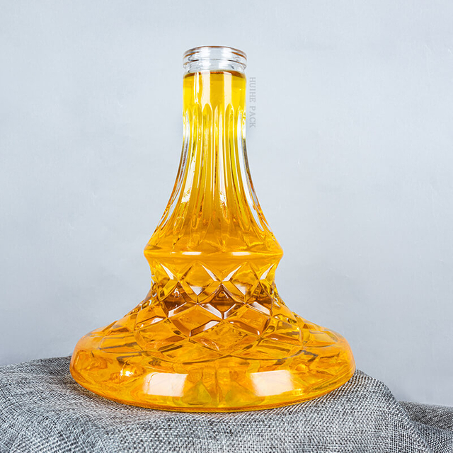 Bouteille d'alcool large large avec un diamant à motifs de bosses