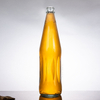 Bouteille de jus de pomme orange en verre transparent de 875 ml avec bouchon couronne