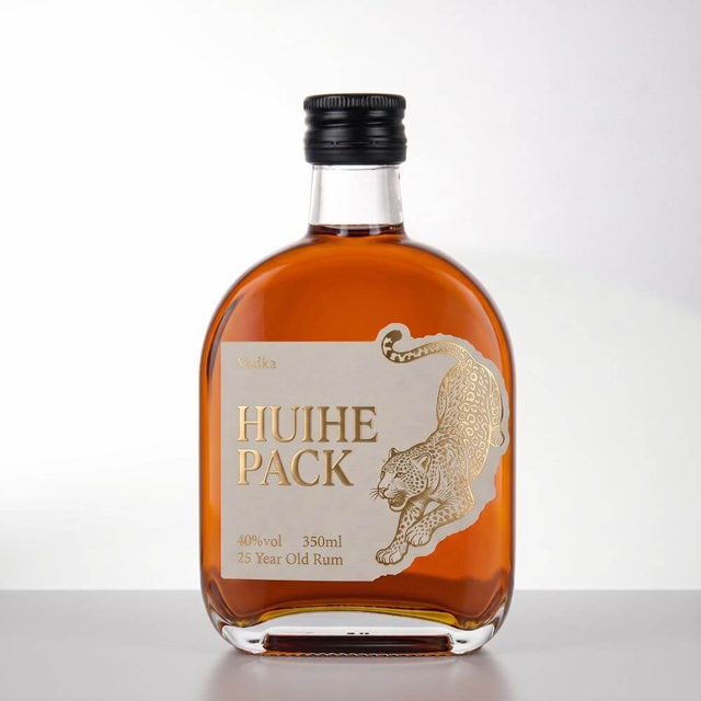 Bouteille d'alcool en verre transparent ovale avec bouchon &agrave; vis