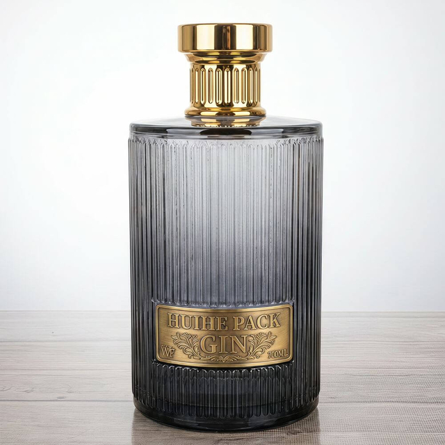Bouteille d'alcool &agrave; cylindre c&ocirc;tel&eacute; vertical avec bouchons &agrave; vis