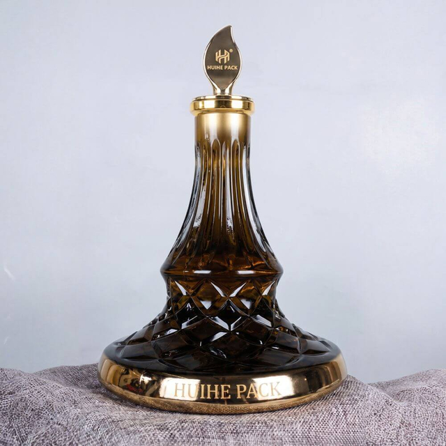Bouteille d'alcool large large avec un diamant &agrave; motifs de bosses