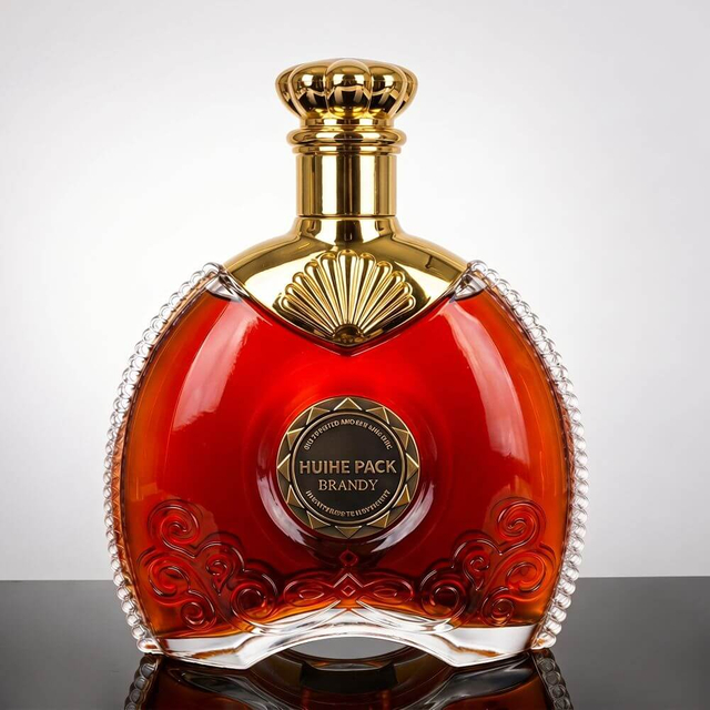 Bouteille d'alcool ovale plate avec motif en forme de cha&icirc;ne autour