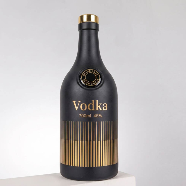 Bouteille d'alcool en verre bulbeux arrondi